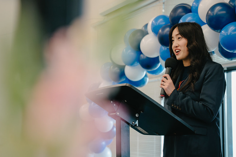 Stacey Wang speaking at event